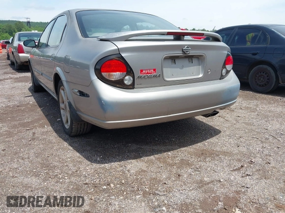 2000 Nissan Maxima GXE z VIN JN1CA31D0YT531421, wystawiony jako IAAI lot #42197398 z przebiegiem Nie podano mil oraz . Historia ofert i sprzedaży dostępna na DreamBid. Obrazek 6.