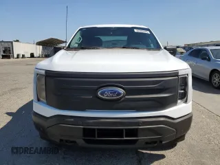 2023 Ford F-150 Lightning Pro with VIN 1FT6W1EVXPWG44972, listed as a Copart auction lot 60303485 with 19,788 mi miles and Salvage title. Bid and sale history available at DreamBid. Image 5.
