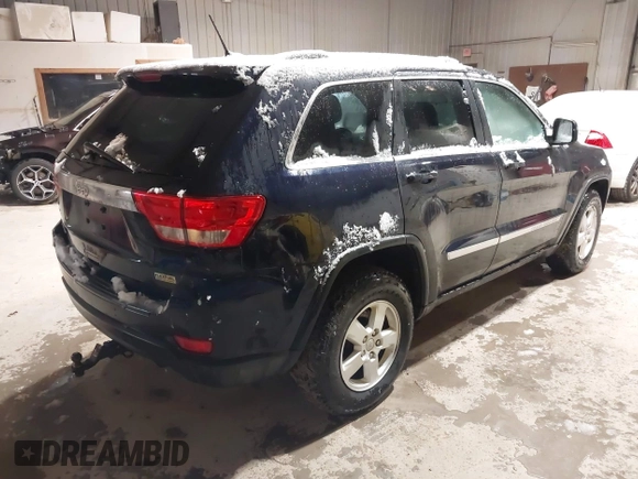2011 Jeep Grand Cherokee Laredo with VIN 1J4RR4GG3BC640075, listed as a IAAI auction lot 41712754 with 190,199 mi miles. Bid and sale history available at carsss.com. Image 4.
