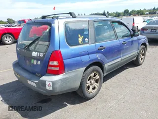 2003 Subaru Forester X with VIN JF1SG63683H708550, listed as a IAAI auction lot 42774386 with 235,032 mi miles and . Bid and sale history available at DreamBid. Image 4.