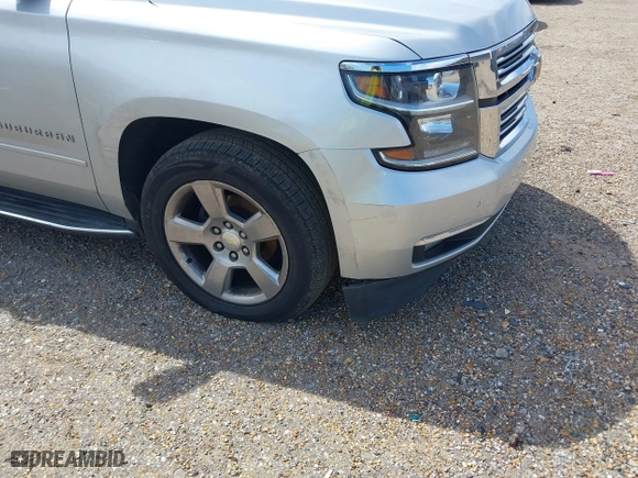2020 Chevrolet Suburban Premier with VIN 1GNSCJKCXLR219679, listed as a IAAI auction lot 41806579 with 90,132 mi miles. Bid and sale history available at carsss.com. Image 6.