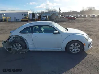 2019 Volkswagen Beetle SE with VIN 3VWJD7AT6KM713525, listed as a IAAI auction lot 41508195 with 73,360 mi miles. Bid and sale history available at carsss.com. Image 13.