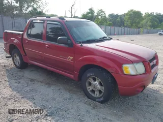 2004 Ford Explorer Sport Trac XLS z VIN 1FMZU77KX4UA69977, wystawiony jako IAAI lot #42453038 z przebiegiem 211 580 mil mil oraz . Historia ofert i sprzedaży dostępna na DreamBid. Obrazek 1.