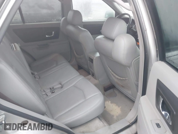 2006 Cadillac SRX z VIN 1GYEE637960184635, wystawiony jako IAAI lot #41724397 z przebiegiem 284 895 mil mil oraz . Historia ofert i sprzedaży dostępna na DreamBid. Obrazek 8.