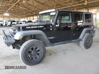 2009 Jeep Wrangler Unlimited Rubicon with VIN 1J4GA69129L703342, listed as a Copart auction lot 61956275 with 186,921 mi miles and Clean title. Bid and sale history available at DreamBid. Image 1.