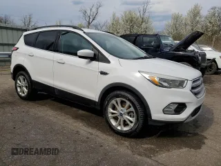 2018 Ford Escape SE with VIN 1FMCU9GD5JUA41244, listed as a Copart auction lot 54447615 with 128,542 mi miles and Clean Title. Bid and sale history available at carsss.com. Image 4.
