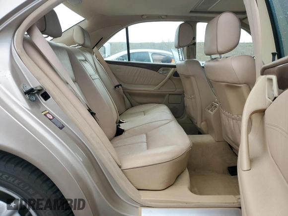2000 Mercedes-Benz E-Class with VIN WDBJF82J0YX040071, listed as a Copart auction lot 50001165 with 145,638 mi miles and Salvage Title. Bid and sale history available at carsss.com. Image 10.