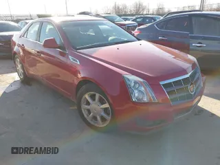 2009 Cadillac CTS AWD w/1SB with VIN 1G6DS57VX90157075, listed as a IAAI auction lot 41872458 with 173,886 mi miles. Bid and sale history available at carsss.com. Image 1.