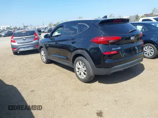 2021 Hyundai Tucson Value with VIN KM8J33A45MU391039, listed as a IAAI auction lot 42086825 with 16,910 mi miles. Bid and sale history available at carsss.com. Image 3.