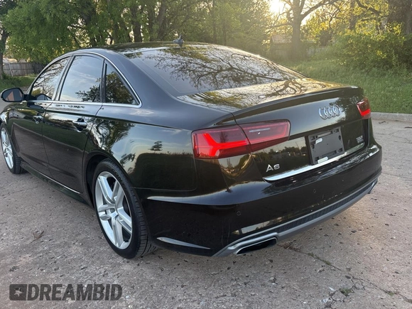 2016 Audi A6 3.0T Premium Plus with VIN WAUFGAFC6GN042406, listed as a Copart auction lot 53582495 with 185,560 mi miles and Clean Title. Bid and sale history available at carsss.com. Image 3.
