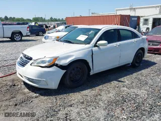 2014 Chrysler 200 LX with VIN 1C3CCBAB5EN123551, listed as a IAAI auction lot 42009218 with 145,661 mi miles. Bid and sale history available at carsss.com. Image 2.