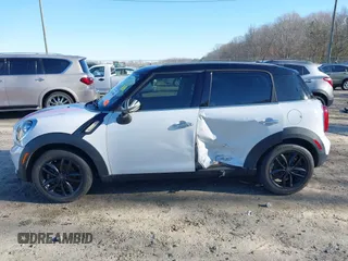 2012 MINI Countryman with VIN WMWZB3C50CWM30524, listed as a IAAI auction lot 41623400 with 194,858 mi miles and . Bid and sale history available at DreamBid. Image 14.