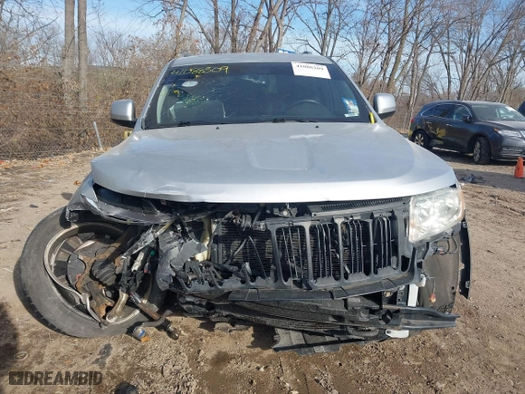 2011 Jeep Grand Cherokee Laredo with VIN 1J4RR4GTXBC678304, listed as a IAAI auction lot 41088309 with 139,559 mi miles. Bid and sale history available at carsss.com. Image 12.