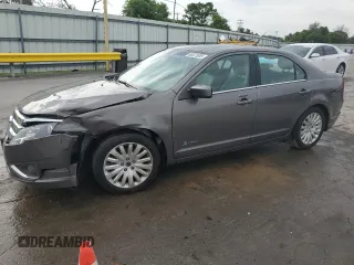2012 Ford Fusion Hybrid с VIN 3FADP0L33CR211609, выставлен на аукционе Copart как лот 60873005 с пробегом 144 474 миль миль и Списание • Salvage title. История ставок и продаж доступна на DreamBid. Изображение 1.