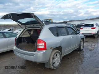 2010 Jeep Compass Sport with VIN 1J4NF4FB3AD589361, listed as a IAAI auction lot 41449412 with 127,807 mi miles. Bid and sale history available at carsss.com. Image 4.