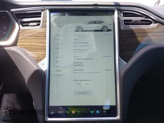 2014 Tesla Model S 60 z VIN 5YJSA1H13EFP33659, wystawiony jako IAAI lot #42101491 z przebiegiem 113 460 mil mil oraz . Historia ofert i sprzedaży dostępna na DreamBid. Obrazek 16.