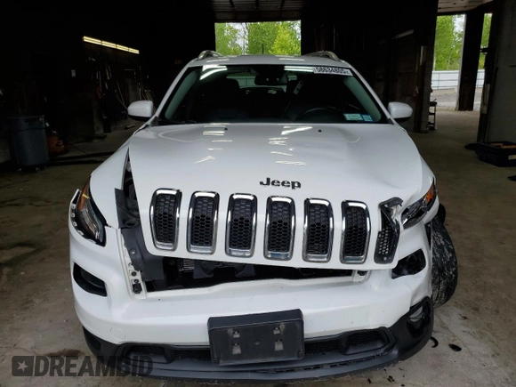 2015 Jeep Cherokee Latitude z VIN 1C4PJMCS7FW624366, wystawiony jako Copart lot #58634805 z przebiegiem 80 598 mil mil oraz Szkoda całkowita • Salvage title. Historia ofert i sprzedaży dostępna na DreamBid. Obrazek 5.