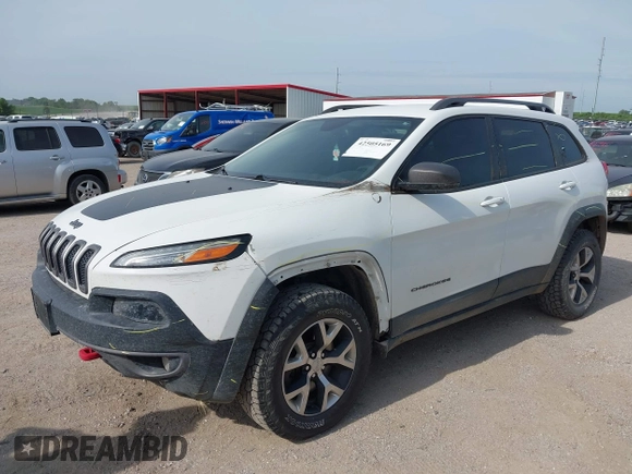2015 Jeep Cherokee Trailhawk with VIN 1C4PJMBS6FW687718, listed as a IAAI auction lot 42505169 with 122,526 mi miles and . Bid and sale history available at DreamBid. Image 18.