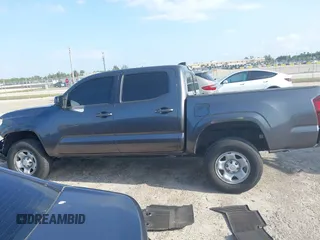2021 Toyota Tacoma SR with VIN 3TYAX5GN9MT022049, listed as a IAAI auction lot 41958816 with 55,151 mi miles and . Bid and sale history available at DreamBid. Image 14.