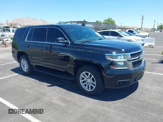 2015 Chevrolet Tahoe Commercial with VIN 1GNLC2EC0FR629983, listed as a IAAI auction lot 42825604 with 112,410 mi miles and . Bid and sale history available at DreamBid. Image 1.