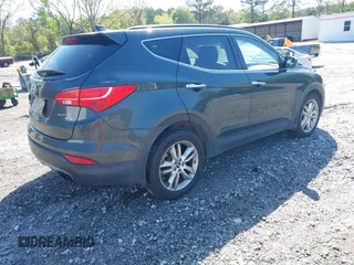 2013 Hyundai Santa Fe Sport z VIN 5XYZUDLA6DG019790, wystawiony jako IAAI lot #41980044 z przebiegiem 282 456 mil mil oraz . Historia ofert i sprzedaży dostępna na DreamBid. Obrazek 4.