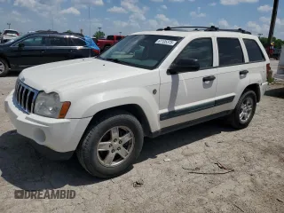 2005 Jeep Grand Cherokee Laredo with VIN 1J4HR48N55C702878, listed as a Copart auction lot 61105375 with 204,934 mi miles and Salvage title. Bid and sale history available at DreamBid. Image 1.