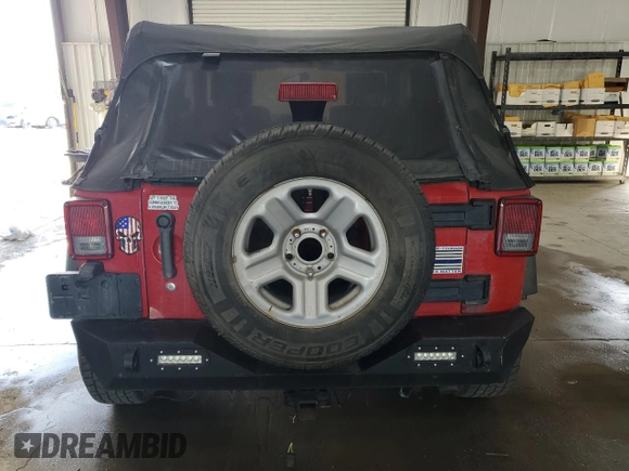 2009 Jeep Wrangler X с VIN 1J4FA24179L734789, выставлен на аукционе Copart как лот 54131245 с пробегом 98 239 миль миль и Списание • Salvage title. История ставок и продаж доступна на DreamBid. Изображение 6.