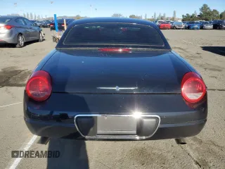 2004 Ford Thunderbird Deluxe with VIN 1FAHP60A94Y105675, listed as a Copart auction lot 87677015 with 91,154 mi miles and Salvage Title. Bid and sale history available at DreamBid. Image 6.