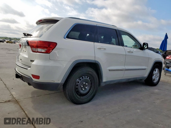 2011 Jeep Grand Cherokee Laredo z VIN 1J4RR4GG2BC617810, wystawiony jako Copart lot #62424125 z przebiegiem 205 945 mil mil oraz Szkoda całkowita • Salvage title. Historia ofert i sprzedaży dostępna na DreamBid. Obrazek 3.