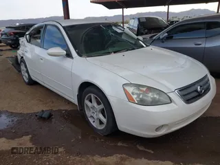 2003 Nissan Altima SE z VIN 1N4BL11D53C131148, wystawiony jako IAAI lot #41252545 z przebiegiem 141 401 mil mil oraz . Historia ofert i sprzedaży dostępna na DreamBid. Obrazek 1.