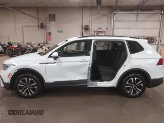 2022 Volkswagen Tiguan S with VIN 3VV0B7AX1NM066089, listed as a IAAI auction lot 41686335 with 64,115 mi miles. Bid and sale history available at carsss.com. Image 14.