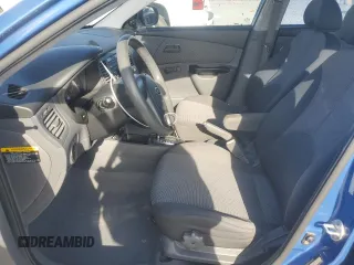 2010 Kia Rio LX with VIN KNADH4A35A6635429, listed as a Copart auction lot 53266835 with 110,615 mi miles and Salvage Title. Bid and sale history available at carsss.com. Image 7.