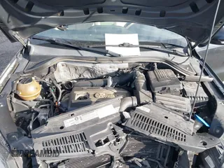 2012 Volkswagen Tiguan SE with VIN WVGAV7AX3CW531264, listed as a IAAI auction lot 41651242 with 190,669 mi miles and . Bid and sale history available at DreamBid. Image 10.