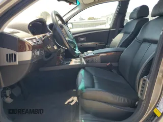 2006 BMW 7 Series 750i with VIN WBAHL83546DT02261, listed as a Copart auction lot 61686475 with 86,909 mi miles and Salvage title. Bid and sale history available at DreamBid. Image 7.