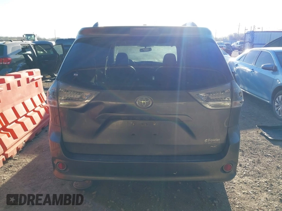 2014 Toyota Sienna SE with VIN 5TDXK3DC1ES462473, listed as a IAAI auction lot 41811437 with 209,704 mi miles and . Bid and sale history available at DreamBid. Image 16.
