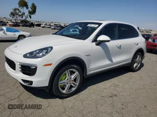 2016 Porsche Cayenne S E-Hybrid z VIN WP1AE2A25GLA61353, wystawiony jako Copart lot #59821105 z przebiegiem 98 905 mil mil oraz Czysty tytuł • Clean title. Historia ofert i sprzedaży dostępna na DreamBid. Obrazek 1.