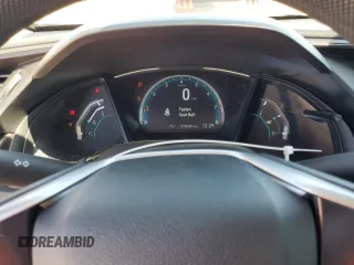 2020 Honda Civic LX z VIN 19XFC2F6XLE027341, wystawiony jako Copart lot #51905915 z przebiegiem 28 600 mil mil oraz Szkoda całkowita • Salvage title. Historia ofert i sprzedaży dostępna na DreamBid. Obrazek 9.
