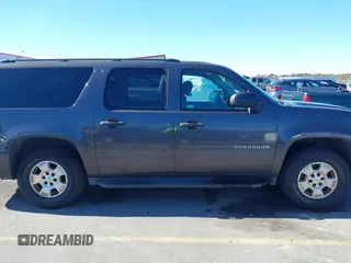 2010 Chevrolet Suburban LS with VIN 1GNUCHE07AR125498, listed as a IAAI auction lot 41427576 with 266,150 mi miles. Bid and sale history available at carsss.com. Image 13.