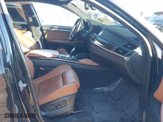 2014 BMW X6 xDrive35i with VIN 5UXFG2C59E0H11200, listed as a IAAI auction lot 41151158 with 140,478 mi miles. Bid and sale history available at carsss.com. Image 5.