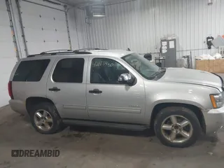 2012 Chevrolet Tahoe LT z VIN 1GNSCBE01CR326465, wystawiony jako IAAI lot #42183450 z przebiegiem 220 129 mil mil oraz . Historia ofert i sprzedaży dostępna na DreamBid. Obrazek 13.