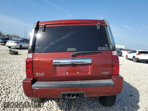 2007 Jeep Commander Limited z VIN 1J8HG58257C610852, wystawiony jako Copart lot #49461225 z przebiegiem 91 125 mil mil oraz Szkoda całkowita • Salvage title. Historia ofert i sprzedaży dostępna na DreamBid. Obrazek 6.