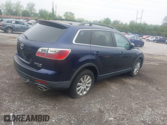 2010 Mazda CX-9 Sport with VIN JM3TB3MVXA0217305, listed as a IAAI auction lot 42188795 with 131,875 mi miles and . Bid and sale history available at DreamBid. Image 4.