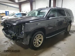 2016 GMC Yukon XL SLE with VIN 1GKS2FKC5GR335830, listed as a Copart auction lot 71294384 with 85,092 mi miles and Salvage Title. Bid and sale history available at carsss.com. Image 1.
