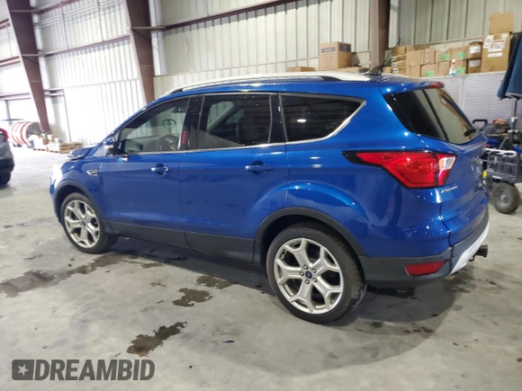 2019 Ford Escape Titanium с VIN 1FMCU0J91KUB47689, выставлен на аукционе Copart как лот 57995445 с пробегом 68 811 миль миль и Списание • Salvage title. История ставок и продаж доступна на DreamBid. Изображение 2.