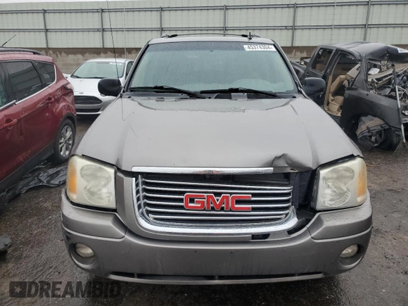 2006 GMC Envoy SLT with VIN 1GKDT13S262141598, listed as a Copart auction lot 45374304 with 258,039 mi miles and Salvage Title. Bid and sale history available at carsss.com. Image 5.