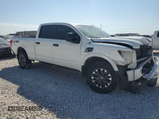 2017 Nissan Titan XD PRO-4X with VIN 1N6BA1F43HN562492, listed as a Copart auction lot 72621804 with 140,562 mi miles and Salvage Title. Bid and sale history available at carsss.com. Image 4.