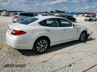 2013 Infiniti M with VIN JN1BY1AR0DM602077, listed as a Copart auction lot 43249275 with 176,392 mi miles and Salvage title. Bid and sale history available at DreamBid. Image 3.
