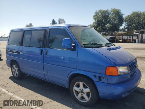 2003 Volkswagen EuroVan с VIN WV2KB470X3H028721, выставлен на аукционе Copart как лот 57531425 с пробегом 233 629 миль миль и Чистый • Clean title. История ставок и продаж доступна на DreamBid. Изображение 4.
