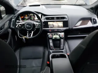 2019 Jaguar I-Pace HSE z VIN SADHD2S15K1F67821, wystawiony jako Copart lot #79313824 z przebiegiem 57 606 mil mil oraz Szkody całkowita. Historia ofert i sprzedaży dostępna na DreamBid. Obrazek 8.
