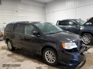 2014 Dodge Grand Caravan SXT 30th Anniversary with VIN 2C4RDGCGXER140681, listed as a Copart auction lot 47735345 with 118,918 mi miles and Salvage Title. Bid and sale history available at carsss.com. Image 4.